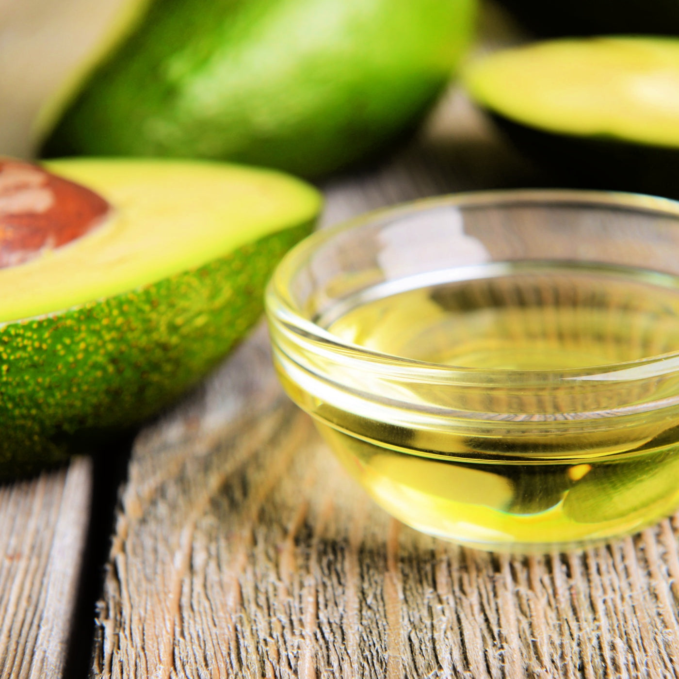 Avocado oil on table close-up